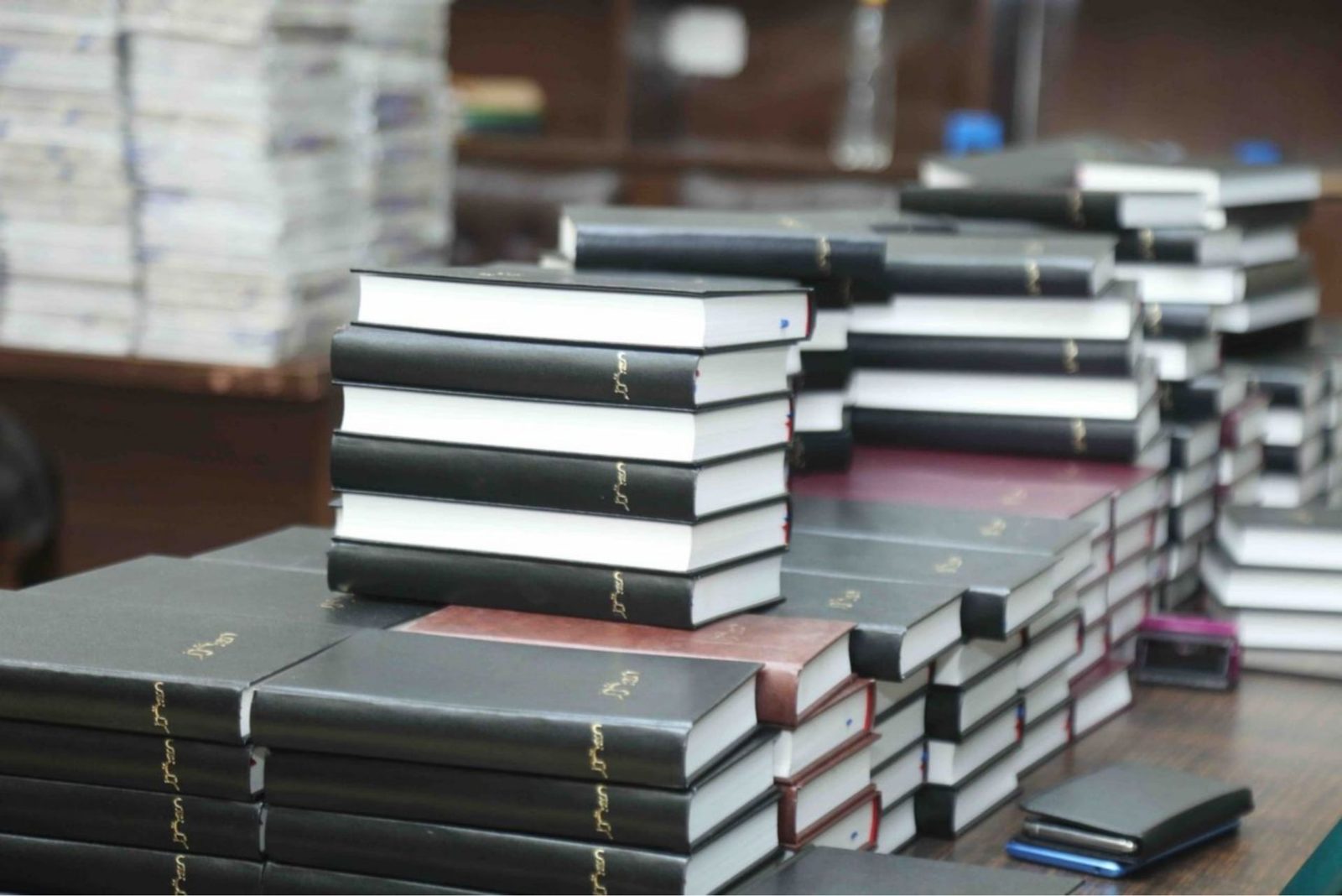 Stacks of new Urdu Bibles ready for free distribution in Pakistan